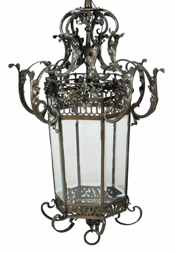 A patinated bronze and bevelled glass hall lantern