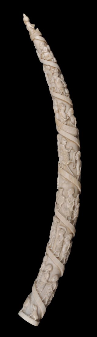 An African carved ivory elephant tusk , early 20th - 2