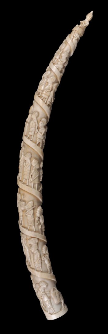 An African carved ivory elephant tusk , early 20th - 3