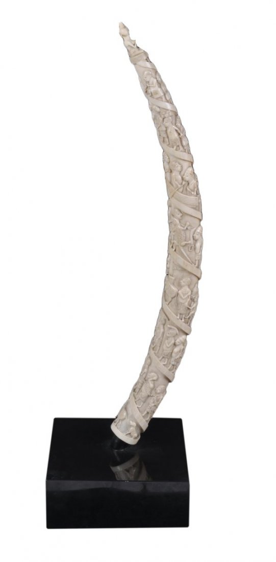 An African carved ivory elephant tusk , early 20th - 4