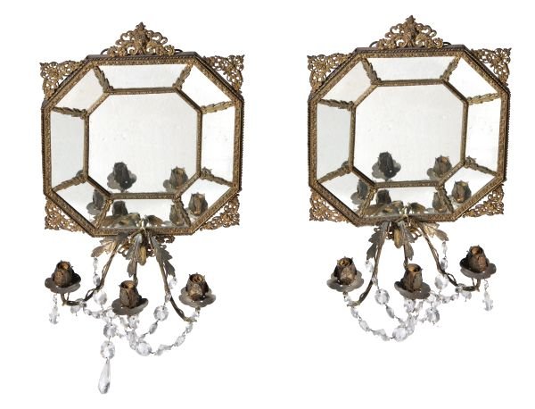 A pair of Continental gilt metal and glass three l