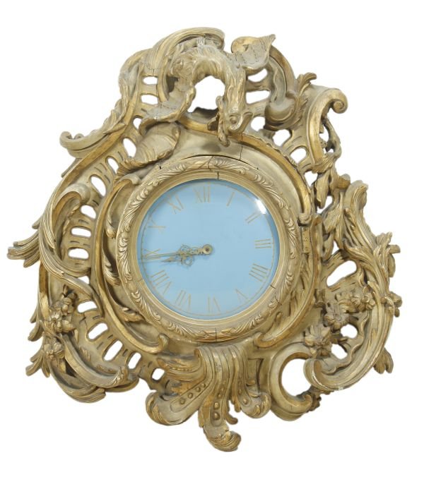 A French carved and giltwood framed cartel wall ti