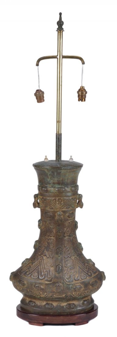 A Chinese bronze lamp base , 20th century, in arch - 2