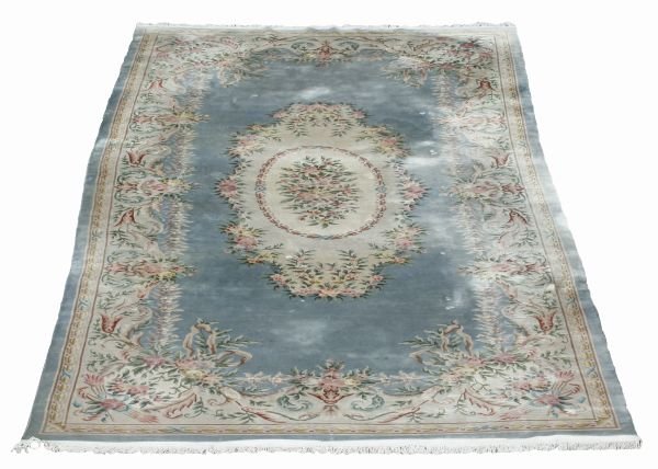 A Chinese woven carpet , late 20th century with ce