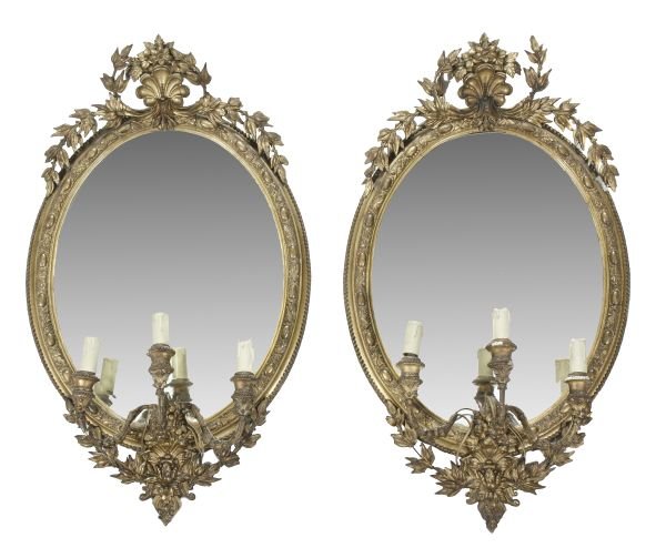 A pair of Victorian gilt composition framed three