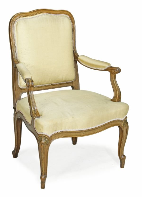 A French upholstered and carved beech fauteuil, e