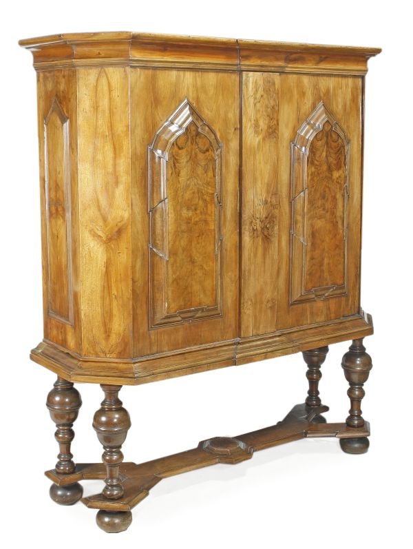 A German walnut cabinet, 18th century and later,