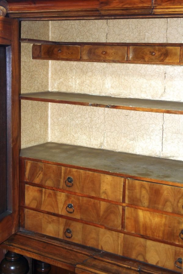 A German walnut cabinet, 18th century and later, - 2