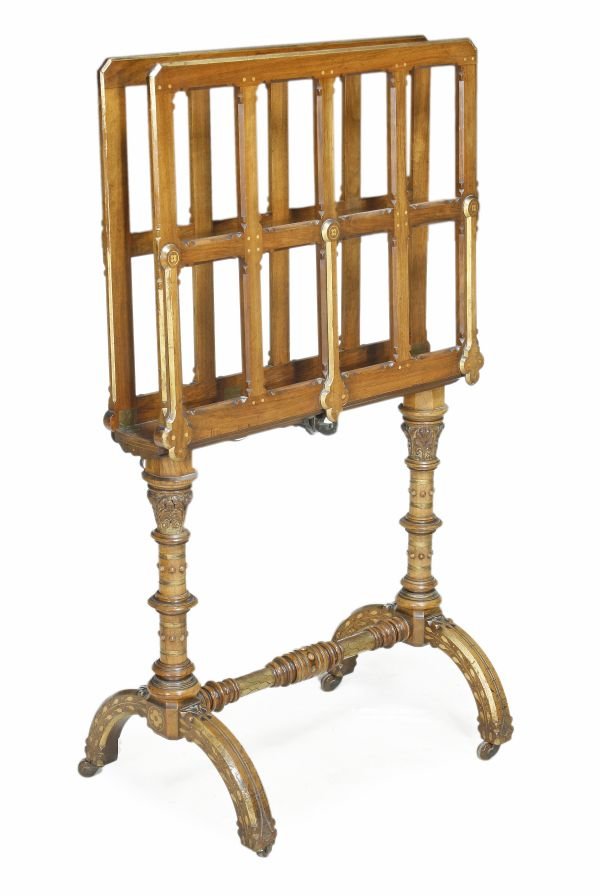 A Victorian Reformed Gothic carved walnut and parc