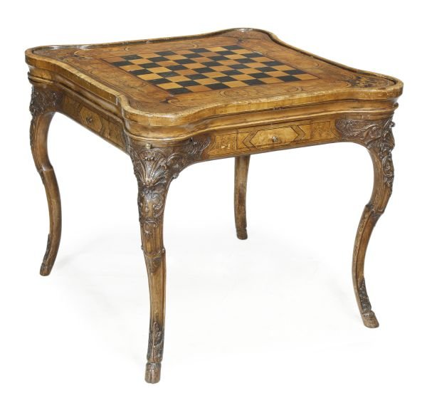 A German walnut and marquetry games table, possibl