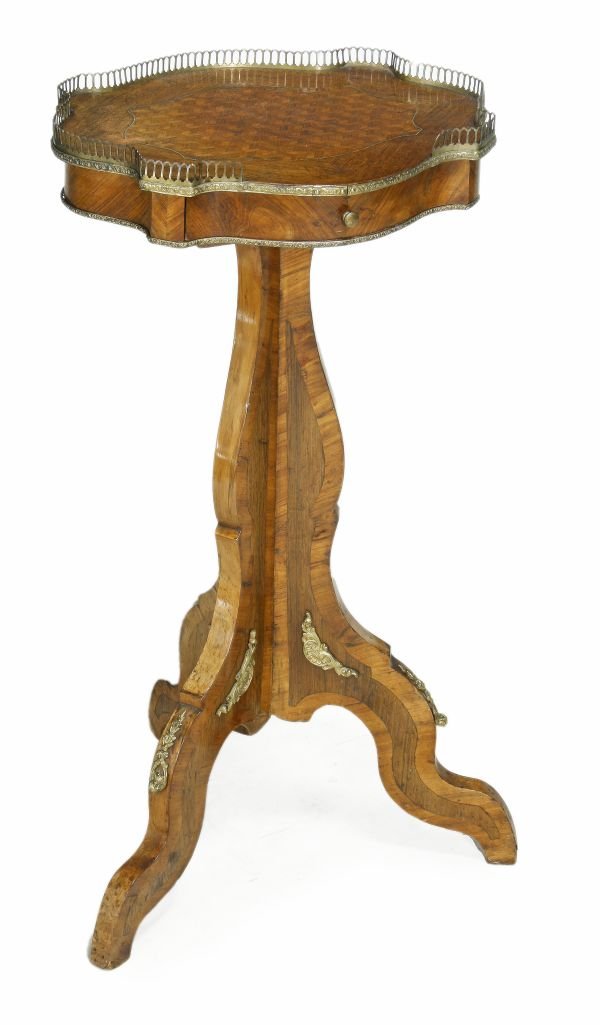 A French mahogany and rosewood parquetry oval occa