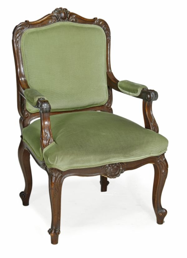 A French walnut and upholstered fauteuil, in Louis