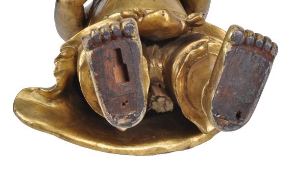 A South East Asian giltwood figure of a boy , late - 5