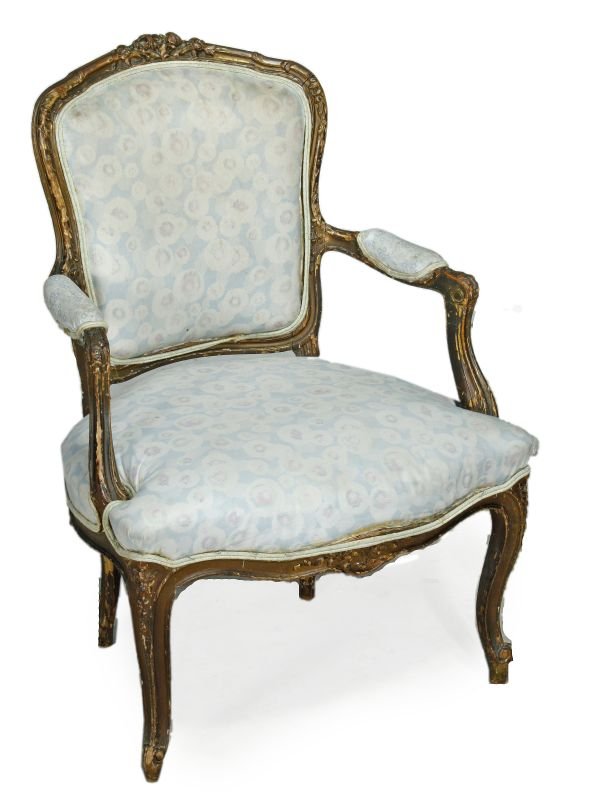 A French carved and giltwood upholstered fauteuil