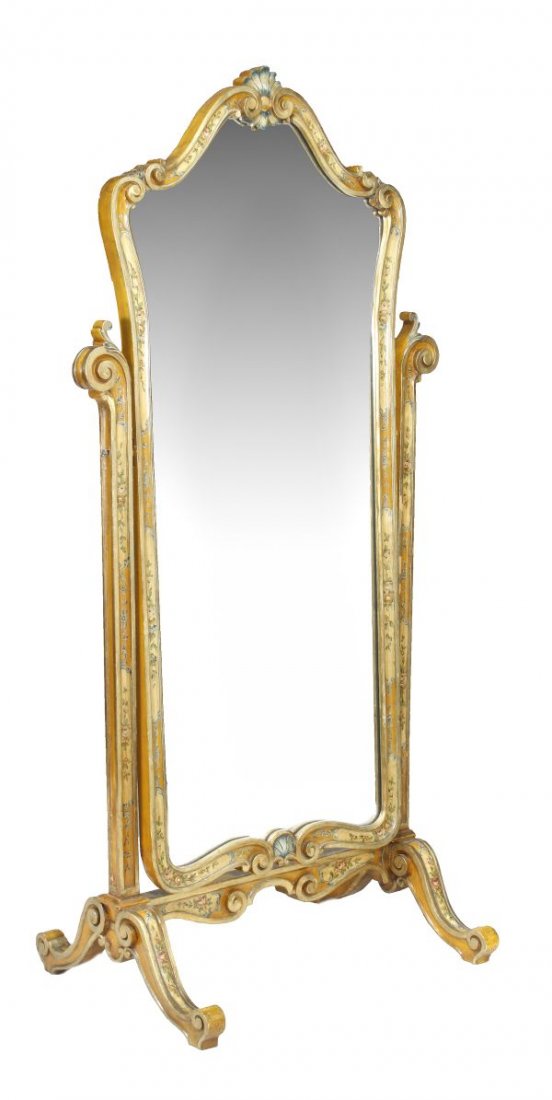 An Italian carved gilded and painted wood framed c
