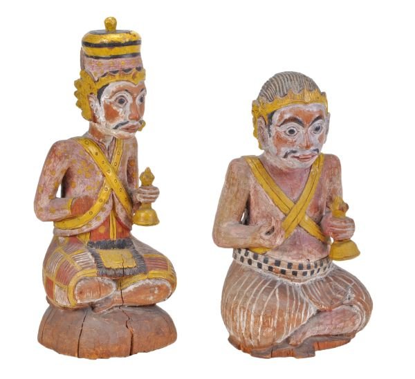 A pair of South East Asian carved wood figures, se