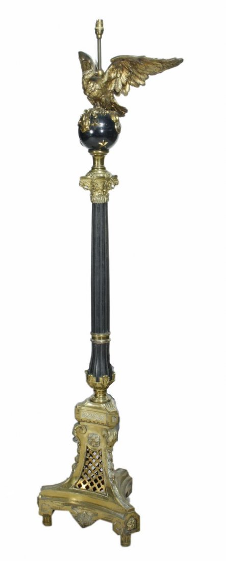 A gilt and patinated metal standard lamp, in the N