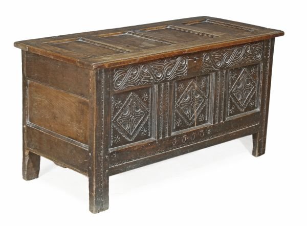 A Charles II carved oak coffer, circa 1660, hinge