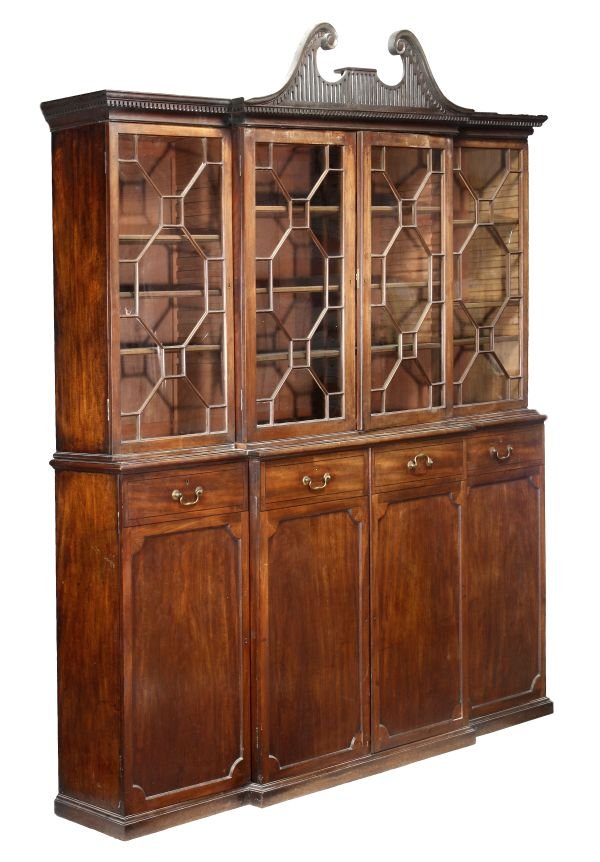 A George III mahogany breakfront bookcase , circa