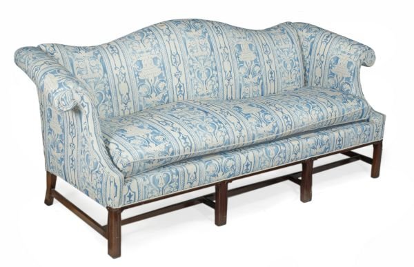 A mahogany framed and upholstered settee in George