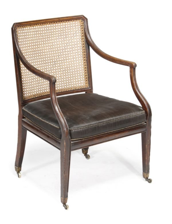 A mahogany framed and caned armchair, 19th centur