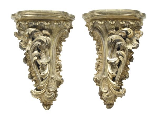 A pair of giltwood wall brackets in George III sty