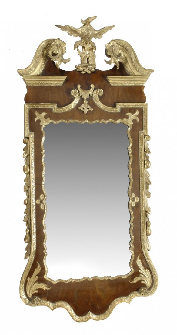 A George III walnut and parcel gilt wall mirror ,