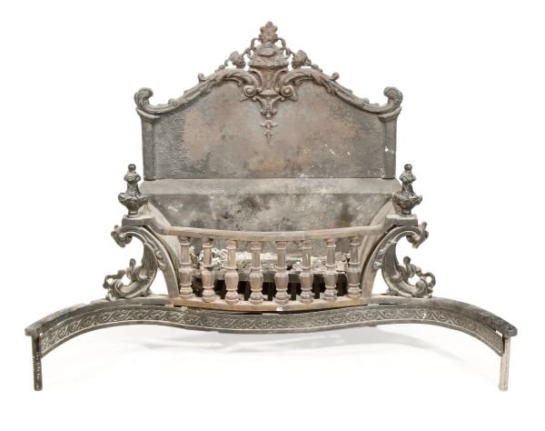 An iron fire grate, in George III style, serpenti