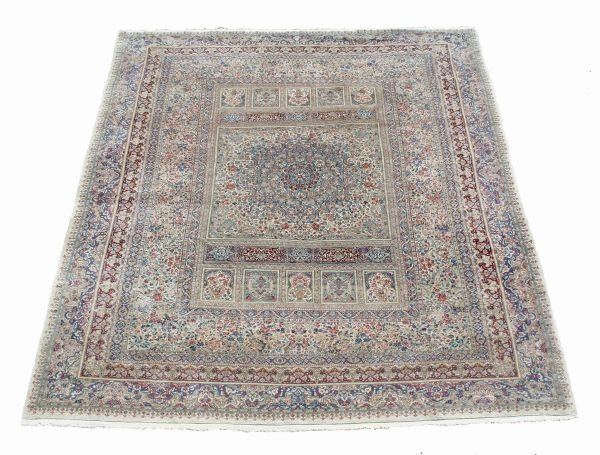 A Kashan carpet, decorated with animals and birds