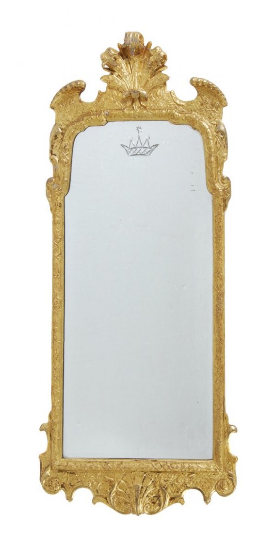 A carved giltwood mirror in George I style, early