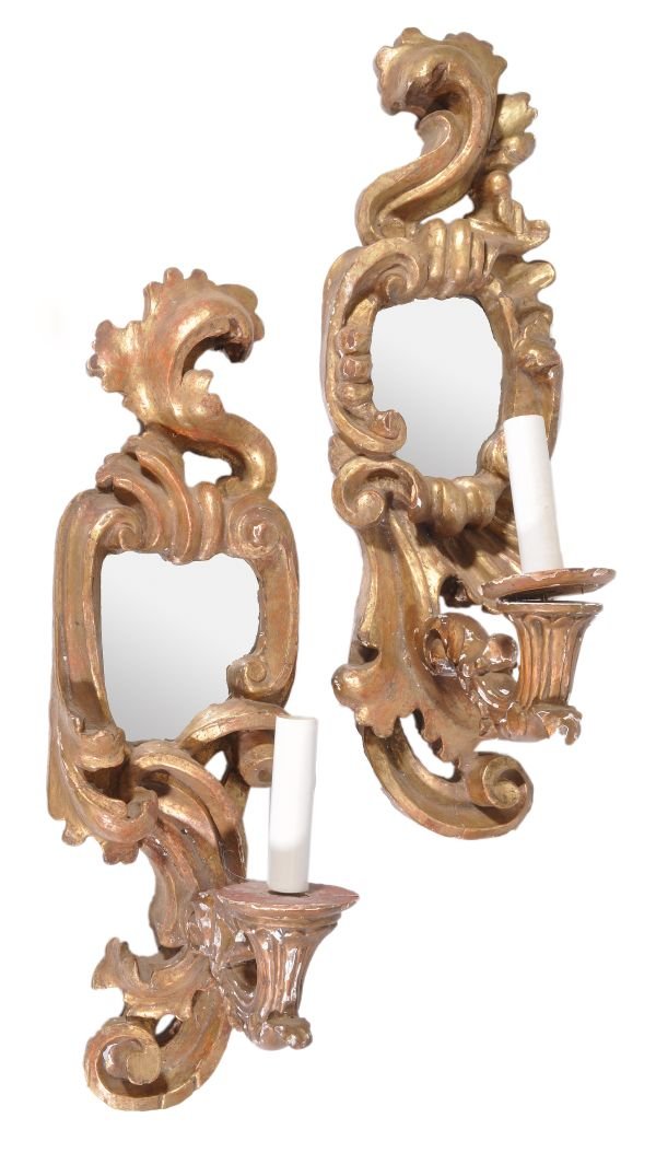 A pair of Italian carved and giltwood girandoles i
