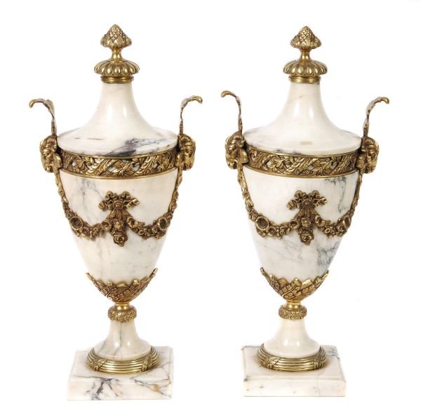 A pair of purple veined variagated marble and gil