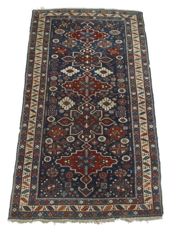 A Shiraz long rug, approximately 276 x 142cm