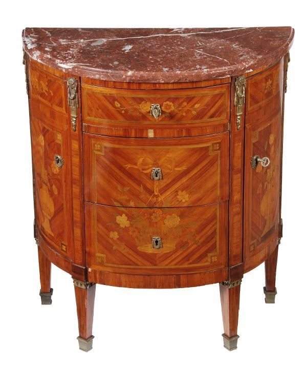 A French tulipwood and marquetry commode, in 18th