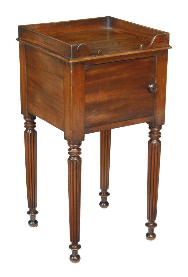 A Regency mahogany bedside cupboard, manner of Gil