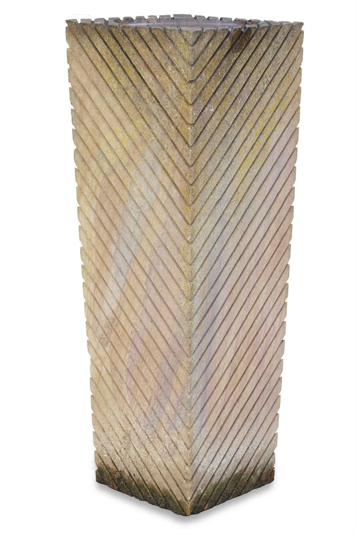 A MODERN GEOMETRIC BIRD BATH, 20TH CENTURY: MODERNA GEOMETRIC BIRD BATH, 20TH CENTURYCarved hard stone, deep linear pattern, slight tapered form100cm high, 36cm wide, 35cm deep