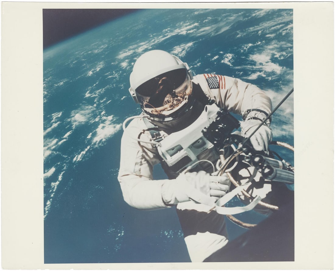 [Gemini IV] THE FIRST PHOTOGRAPH OF A HUMAN IN SPACE TAKEN DURING THE FIRST U.S. SPACEWALK (1 of 2)