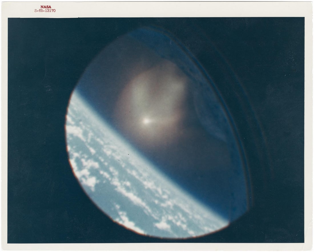 [Gemini II] EARTH DURING ATMOSPHERIC REENTRY, FROM THE GEMINI SPACECRAFT (1 of 2)