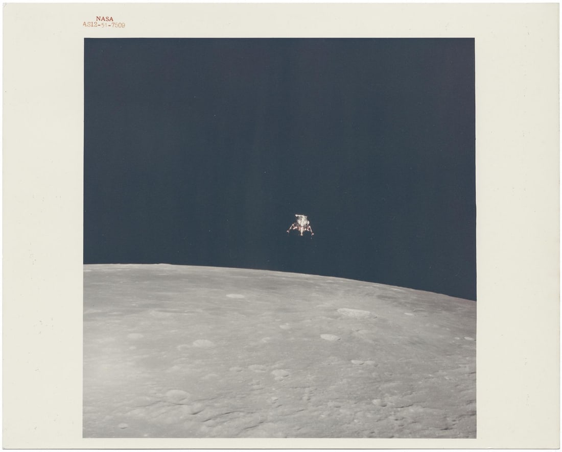 [Apollo 12] INTREPID SOARING ABOVE THE MOON SHORTLY BEFORE TOUCHDOWN (1 of 2)