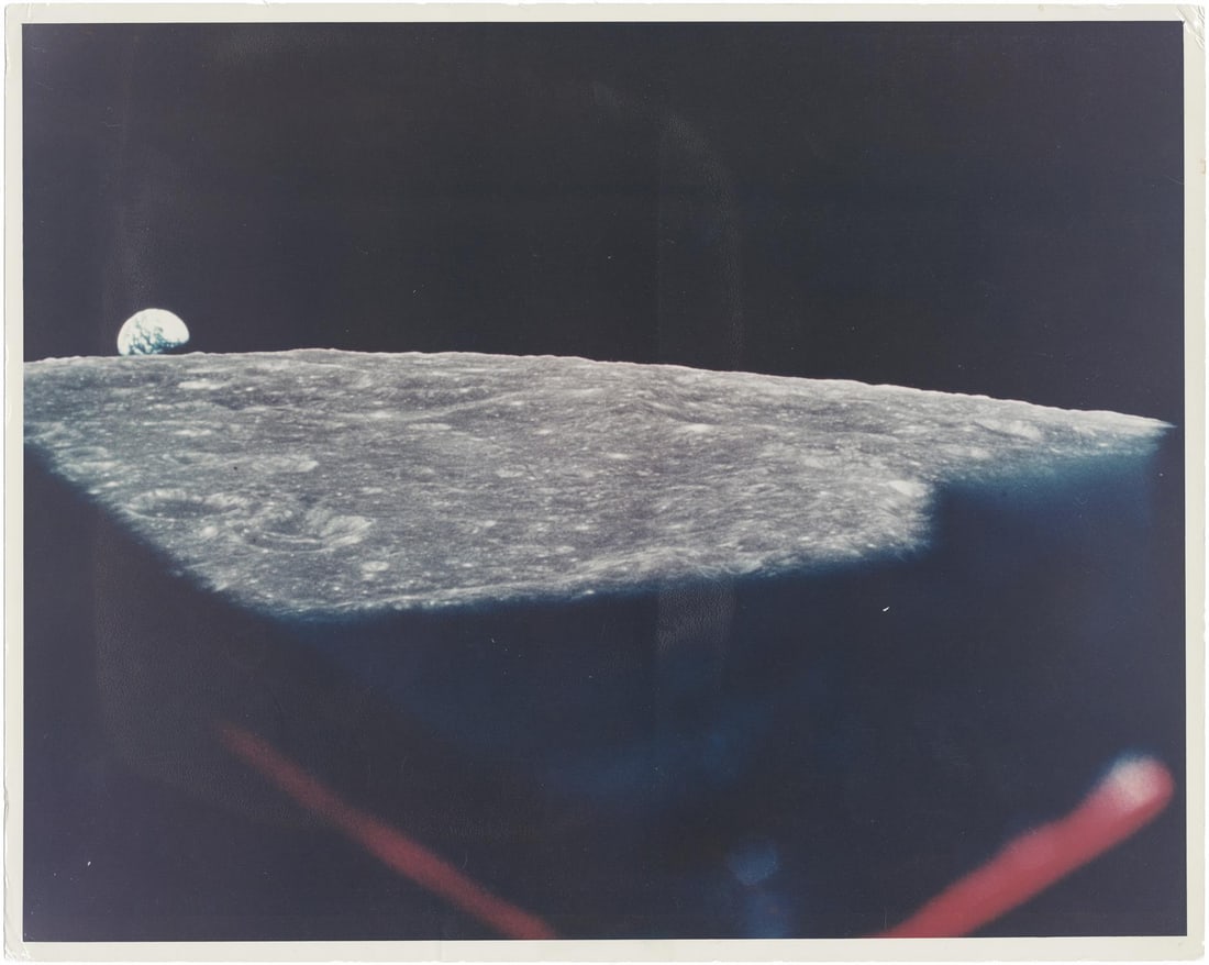 [Apollo 8] LARGE FORMAT: MAJESTIC EARTHRISE SEEN THROUGH THE SPACECRAFT WINDOW (1 of 4)