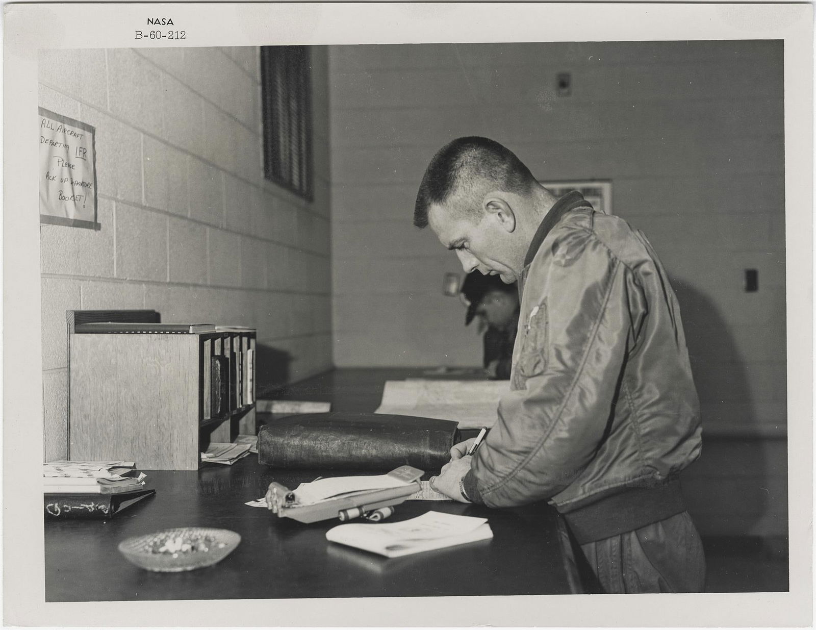 [Project Mercury] DEKE SLAYTON PREPARING FOR THE FIRST MANNED MISSIONS TO SPACE: [Project Mercury] DEKE SLAYTON PREPARING FOR THE FIRST MANNED MISSIONS TO SPACENASA, 1960Printed 1960.Vintage gelatin silver print on fibre-based paper [NASA image B-60-212].Numbered NASA B-60-212 in