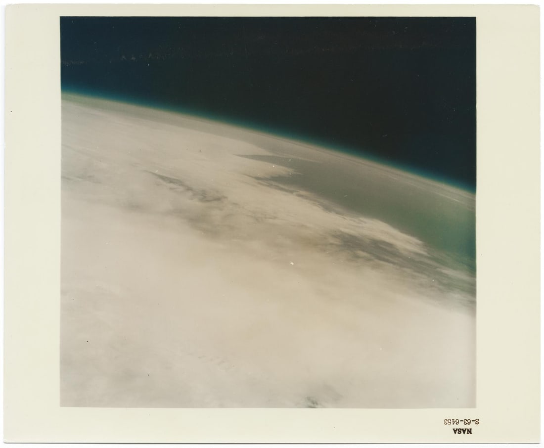 [Mercury Atlas 9] OFFICIAL BIRTH OF HUMAN SPACE PHOTOGRAPHY: EARTH'S HORIZON (1 of 2)