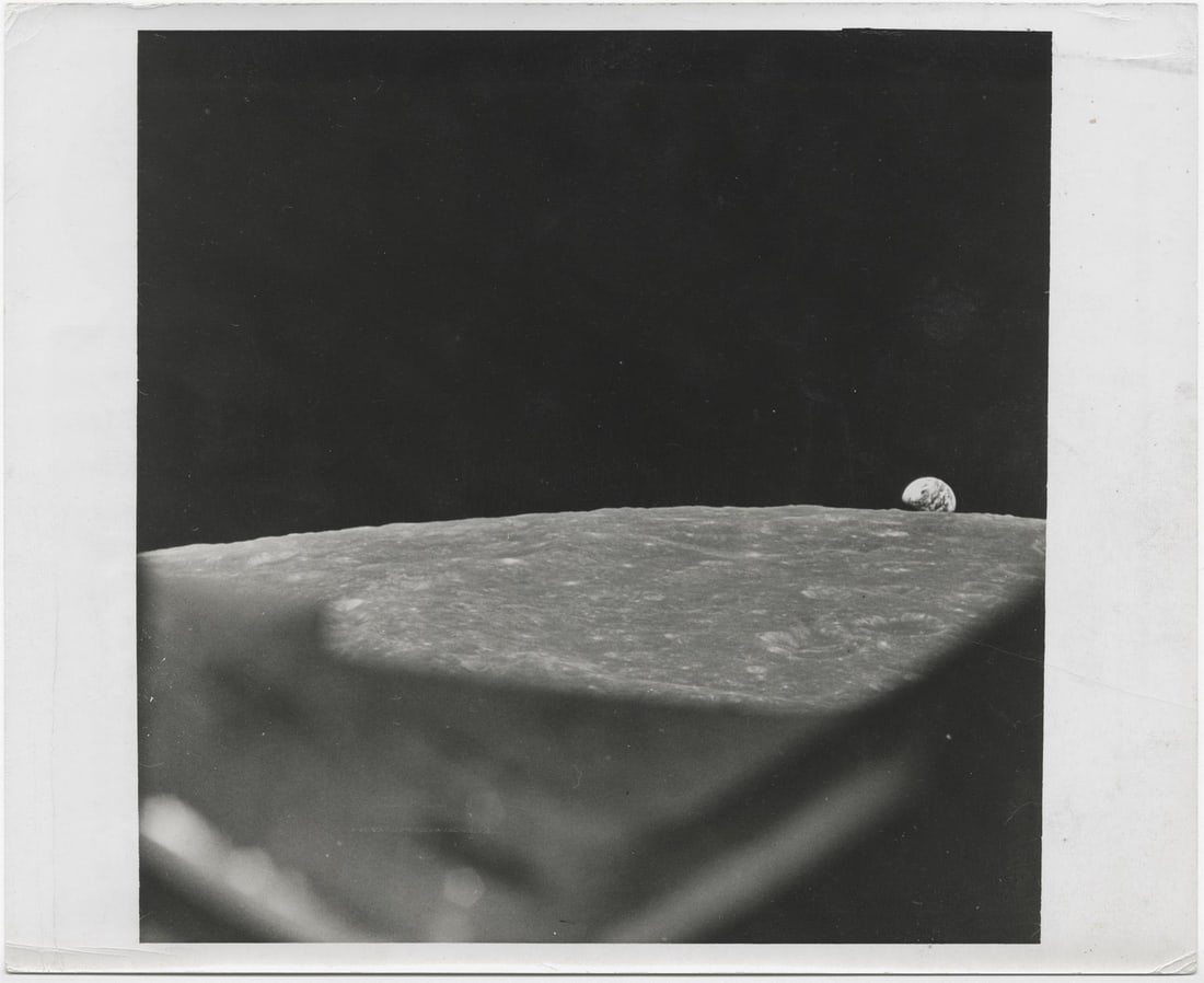 [Apollo 8] MAJESTIC EARTHRISE SEEN THROUGH THE SPACECRAFT WINDOW: [Apollo 8] MAJESTIC EARTHRISE SEEN THROUGH THE SPACECRAFT WINDOWFrank Borman, 21-27 December 1968 Printed 1968.Vintage gelatin silver print on fibre-based paper [B&W version of NASA image AS8-14-2392]