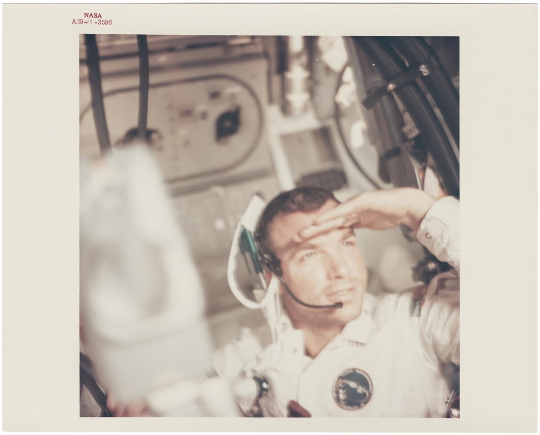 [Apollo 9] PORTRAIT IN ORBIT: DAVID SCOTT LOOKING INTO THE DISTANCE IN DAZZLING SUN (1 of 2)