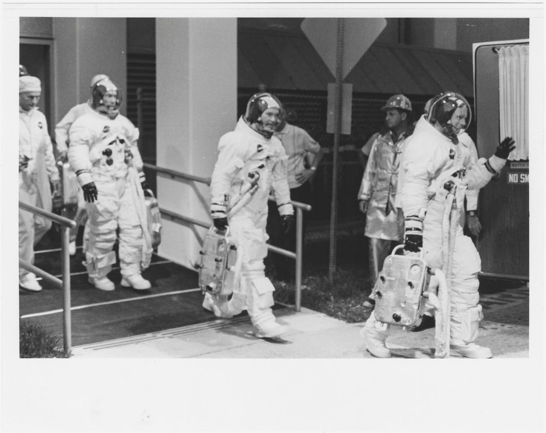 [Apollo 11] THE FIRST LUNAR SURFACE EXPLORERS HEADING TO THE LAUNCH PAD: [Apollo 11] THE FIRST LUNAR SURFACE EXPLORERS HEADING TO THE LAUNCH PADNASA, 3 July 1969 Printed 1969.Vintage gelatin silver print on fibre-based paper.With NASA caption numbered 69-H-1072 and 69-HC-7