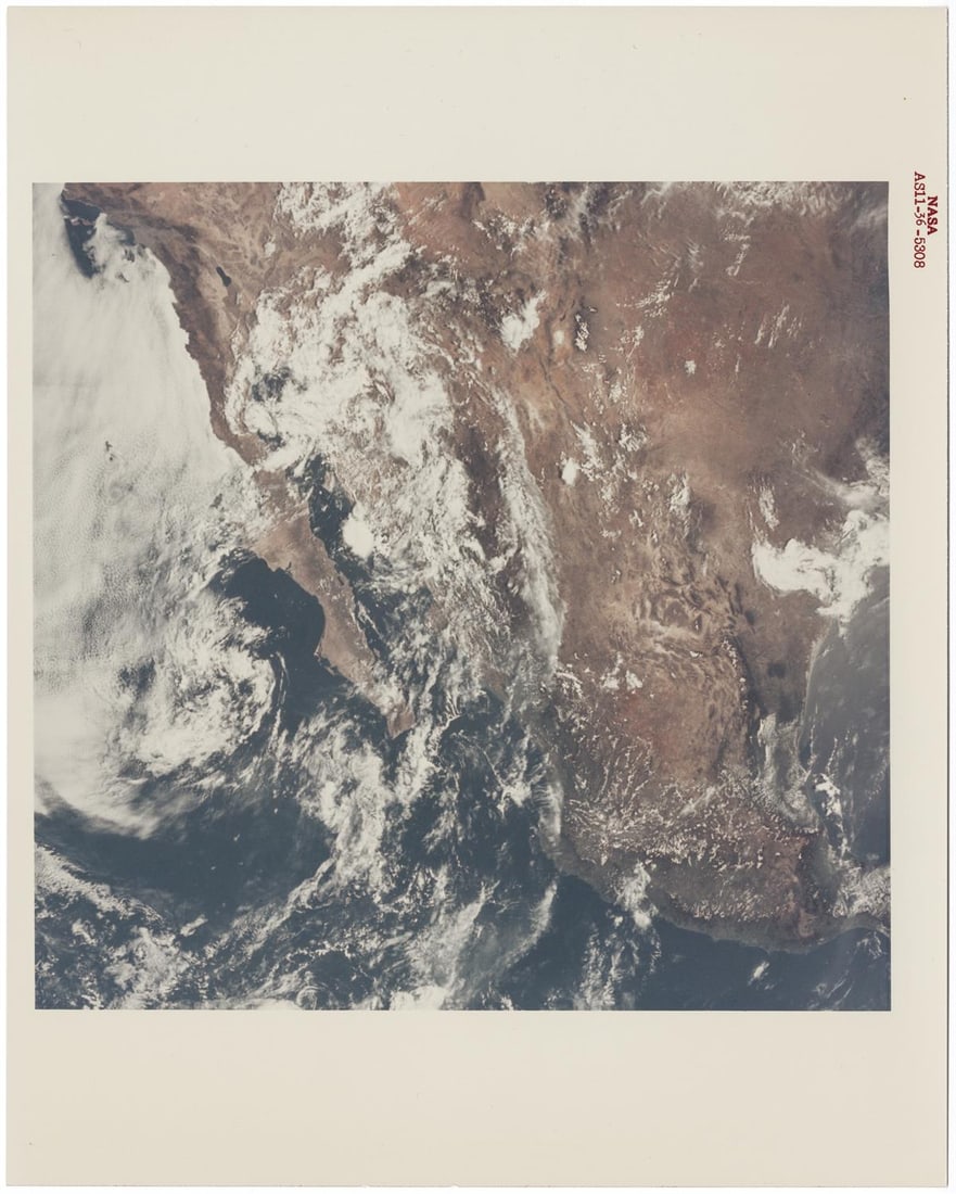 [Apollo 11] EARTH FROM SPACE, FEATURING THE U.S., AFTER TRANSLUNAR INJECTION (1 of 2)
