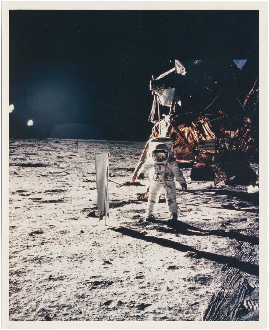 [Apollo 11] BUZZ ALDRIN BESIDE THE EAGLE AND THE SOLAR WIND EXPERIMENT (1 of 2)