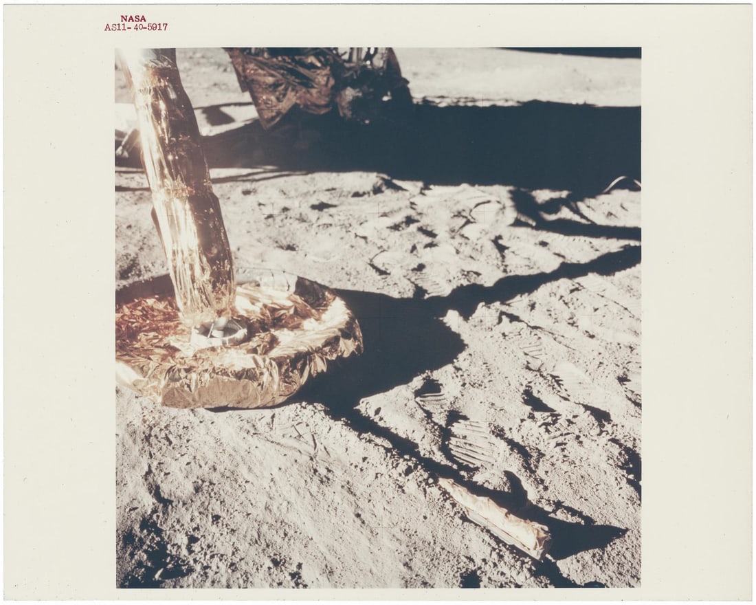 [Apollo 11] HISTORIC FIRST CONTACT: EAGLE’S FOOTPAD AND ASTRONAUT’S FOOTPRINTS: [Apollo 11] HISTORIC FIRST CONTACT: EAGLE'S FOOTPAD AND ASTRONAUT'S FOOTPRINTSBuzz Aldrin, 16-24 July 1969 Printed 1969.Vintage chromogenic print on fibre-based Kodak paper.Numbered NASA