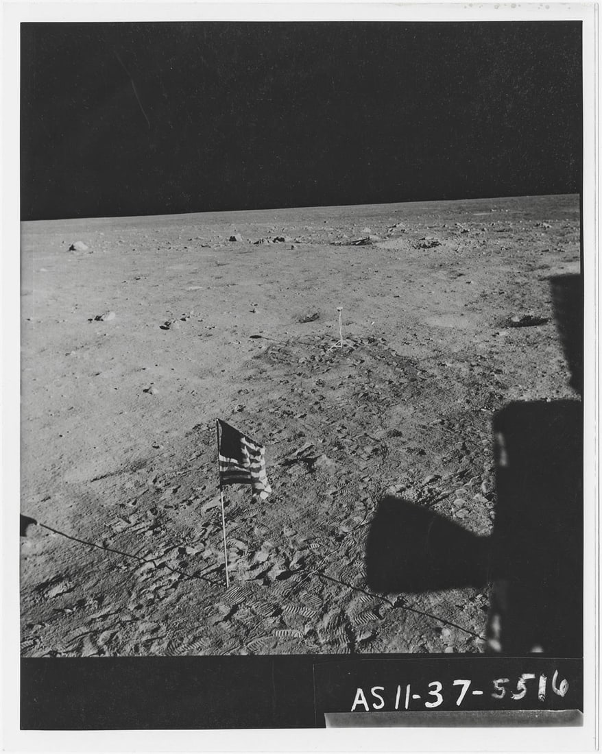 [Apollo 11] FOOTPRINTS SURROUNDING THE U.S. FLAG AT TRANQUILITY BASE: [Apollo 11] FOOTPRINTS SURROUNDING THE U.S. FLAG AT TRANQUILITY BASERare unpublished photograph from magazine 37/R Buzz Aldrin, 16-24 July 1969 Printed 1969.Vintage gelatin silver print on fibre-based