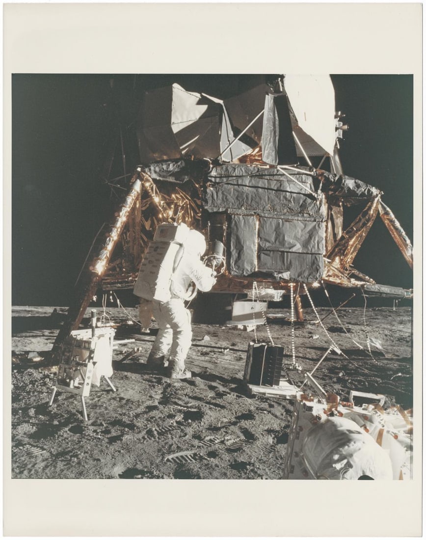 [Apollo 12] ALAN BEAN SETTING UP THE FIRST NUCLEAR GENERATOR NEAR THE LM INTREPID (1 of 3)